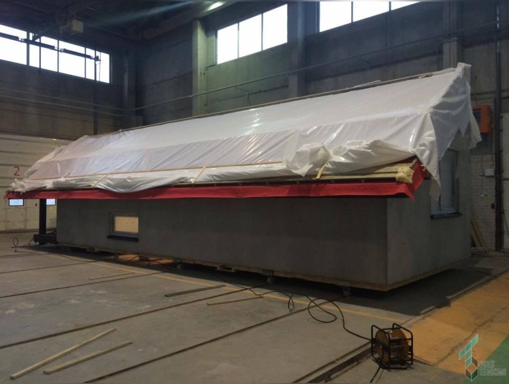 Full-scale construction system prepared in a workshop
